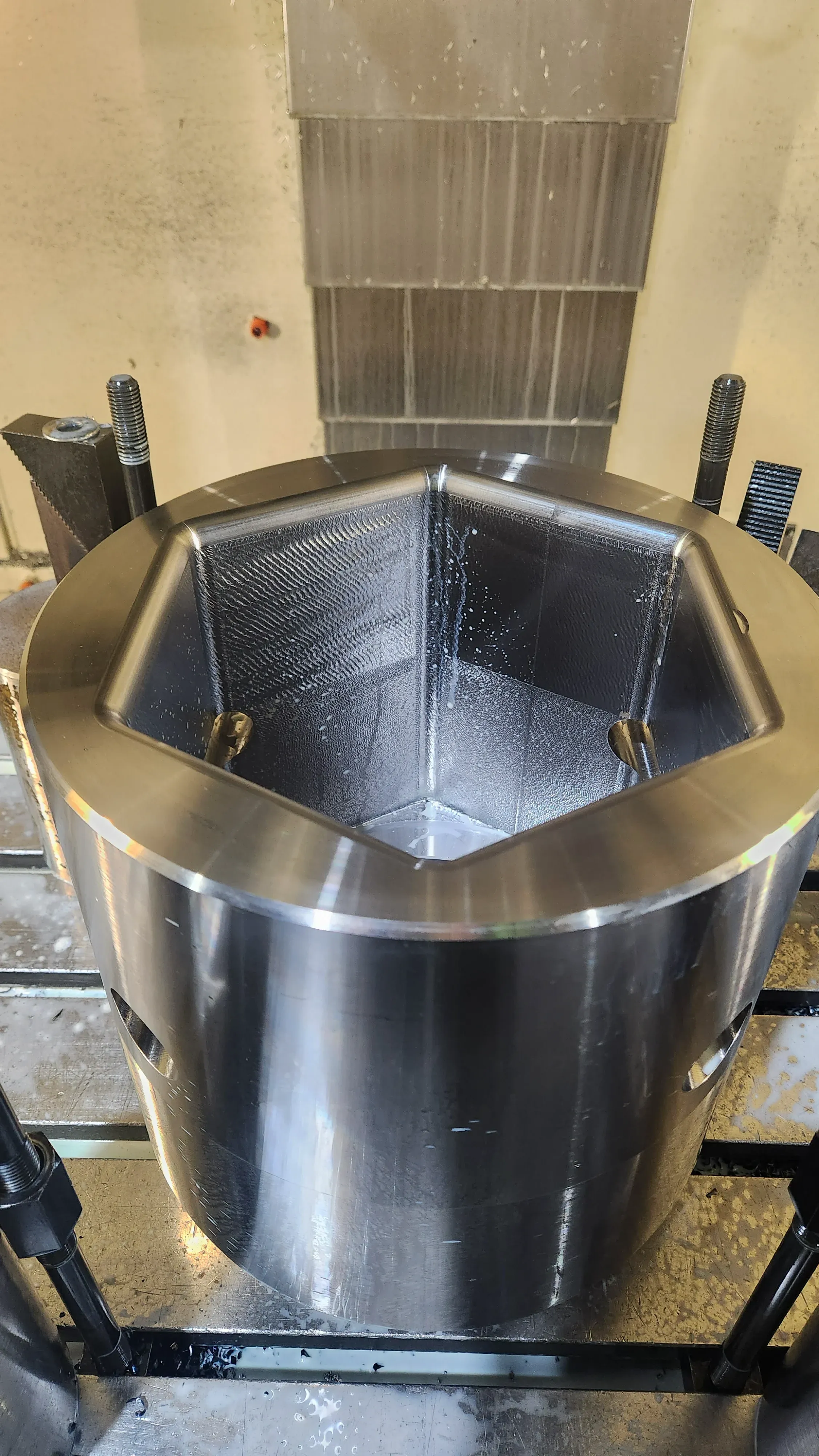Large turned and milled housing on the machine bed